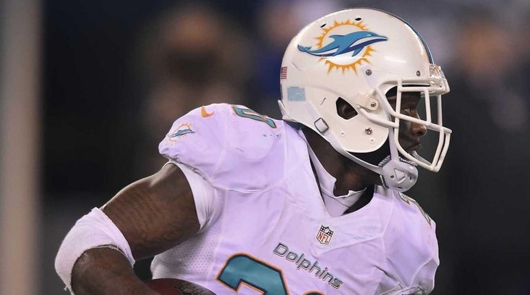 Miami Dolphins strong safety Reshad Jones (20) returns