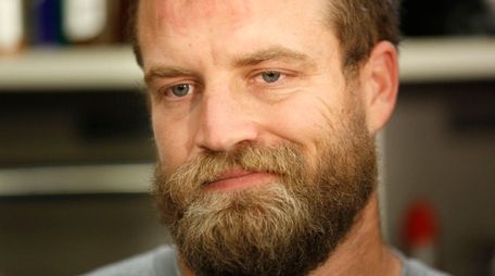 New York Jets quarterback Ryan Fitzpatrick speaks to