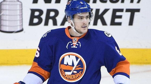 New York Islanders' defenseman Ryan Pulock looks on