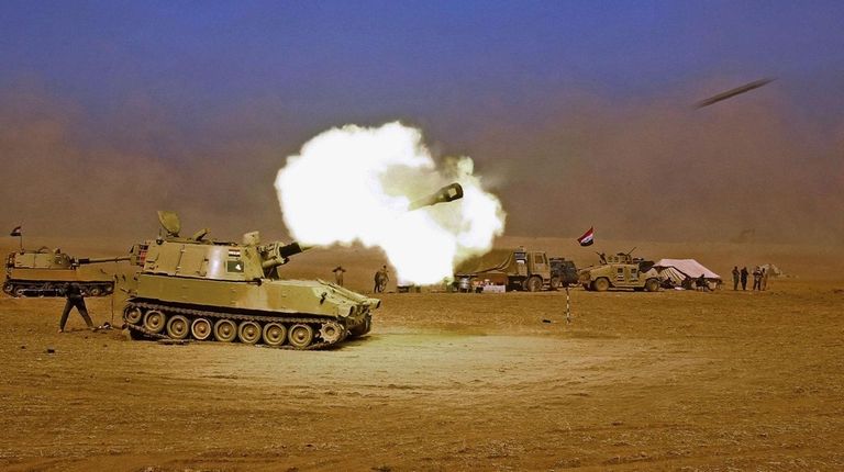 Iraqi forces fight to retake several key