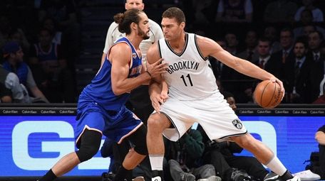 New York Knicks center Joakim Noah defends Brooklyn