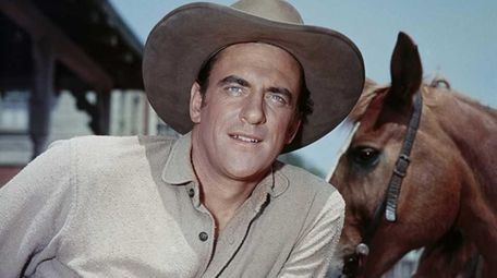 Actor James Arness is shown as Marshal Matt