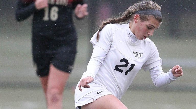 Northport's Cybele Laisney moves the ball in the
