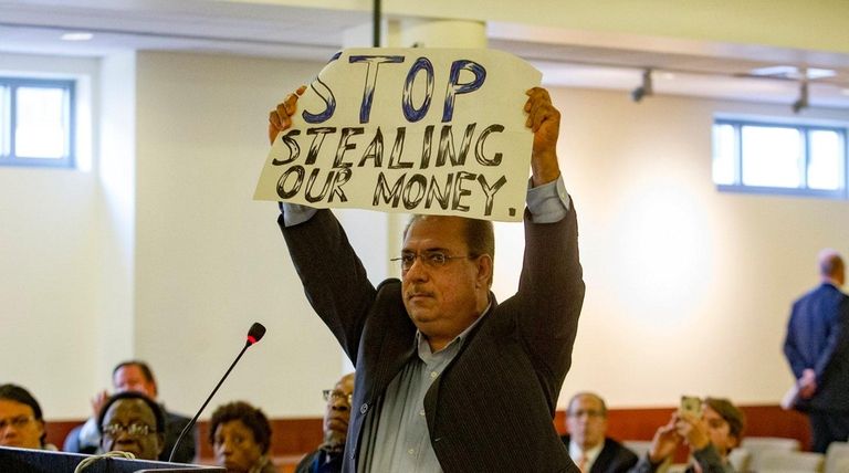 Valley Stream resident Malik Amid expresses displeasure with