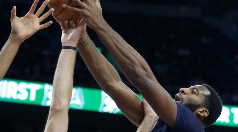Detroit Pistons' Andre Drummond (0) grabs a rebound
