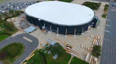 This aerial view shows construction crews at work