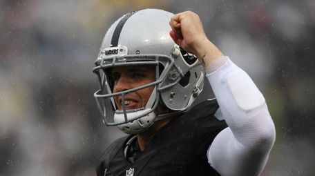 Derek Carr #4 of the Oakland Raiders celebrates