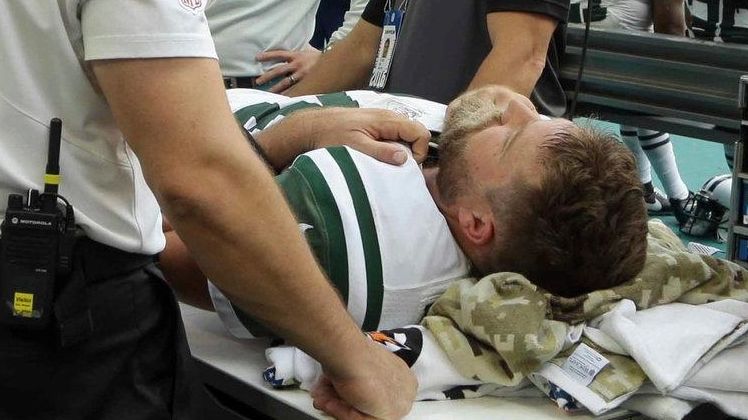 New York Jets quarterback Ryan Fitzpatrick is checked