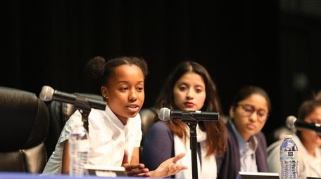 Roosevelt High School student Shauntice Youngs speaks at