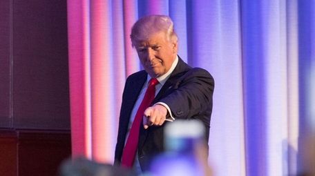 President-elect Donald Trump enters his victory party on