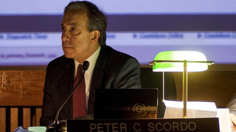 Peter C. Scordo, who retired in June from