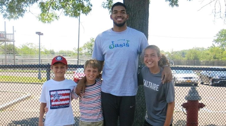 Minnesota Timberwolves basketball star Karl-Anthony Towns with Kidsday
