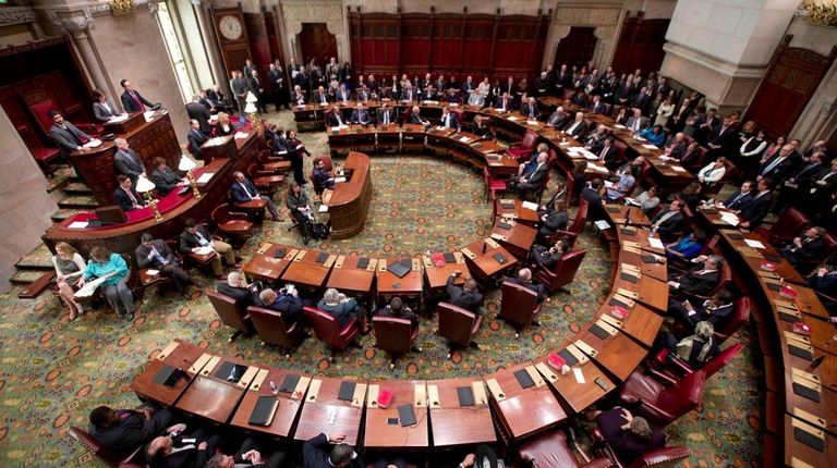 Senators meet in the Senate Chamber at the