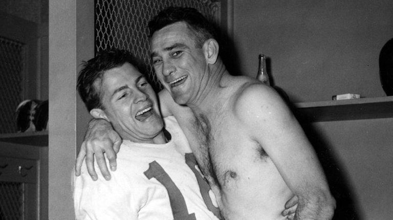 Giants quarterback Charley Conerly, right, and halfback Frank