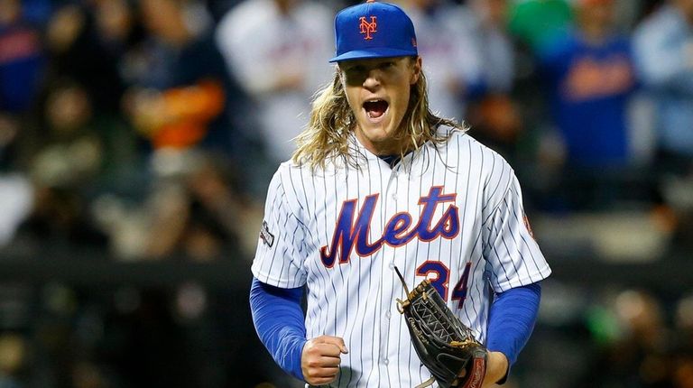 Noah Syndergaard of the Mets reacts after the