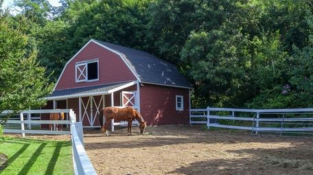 This Riverhead property with a barn is listed