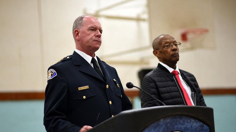 Hempstead Village Police Chief Michael McGowan, left, and