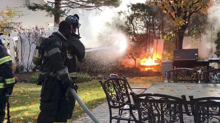 Westbury firefighters respond to a fire on Thursday,