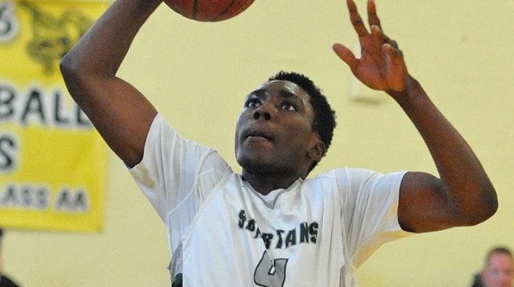K.C. Ndefo #4 of Elmont drives to the