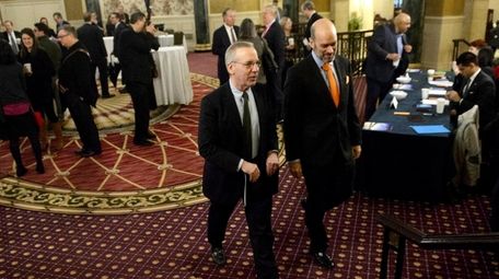 William Dudley, center, president of the Federal Reserve