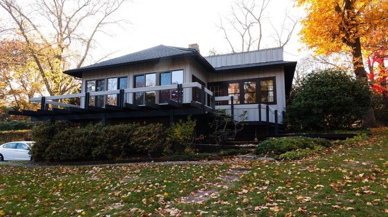 This house in Shoreham features multiple decks. The
