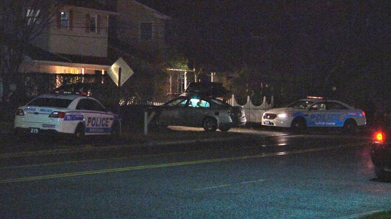 Suffolk County police investigate a crash in Huntington,