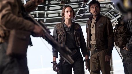 Felicity Jones, left, stars as Jyn Erso and
