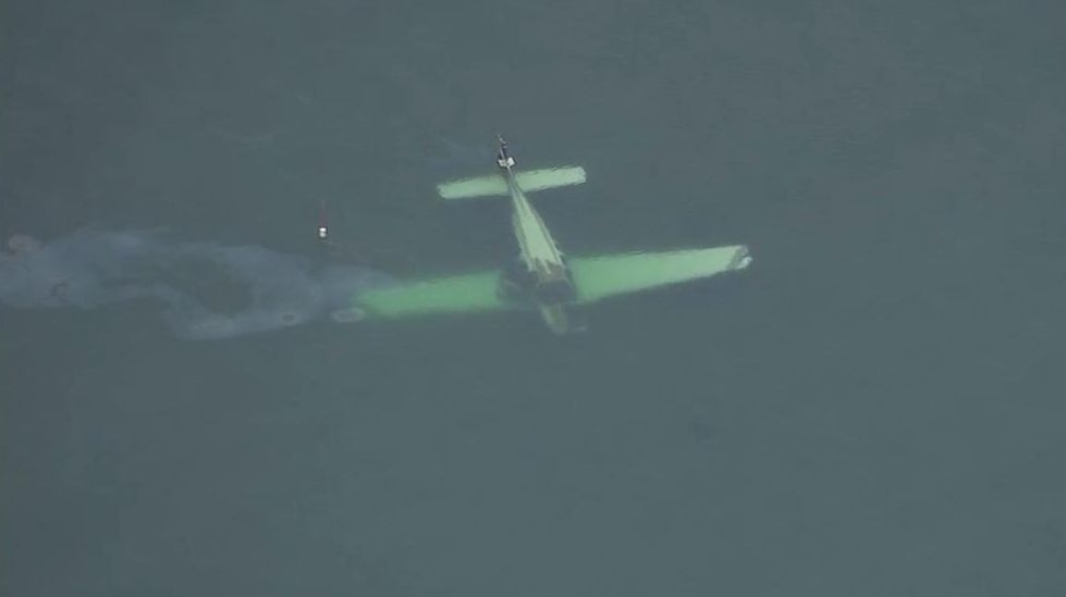 A small plane carrying two people crashed into