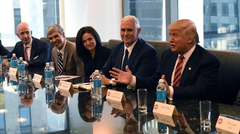 Amazon's Jeff Bezos, Larry Page of Alphabet and