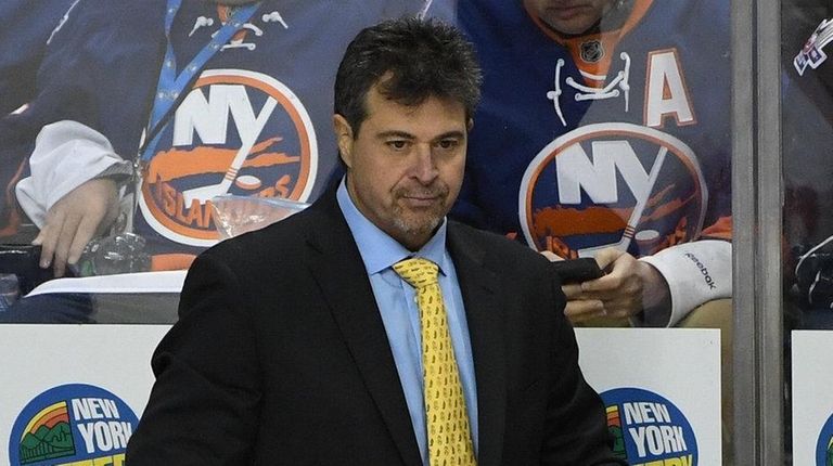 New York Islanders head coach Jack Capuano looks