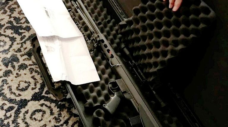 A 50-caliber Barrett rifle worth about $10,000 was
