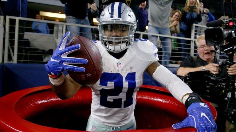 Ezekiel Elliott of the Dallas Cowboys celebrates after