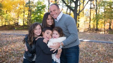 Holly Rizzuto Palker with her family in 2015.