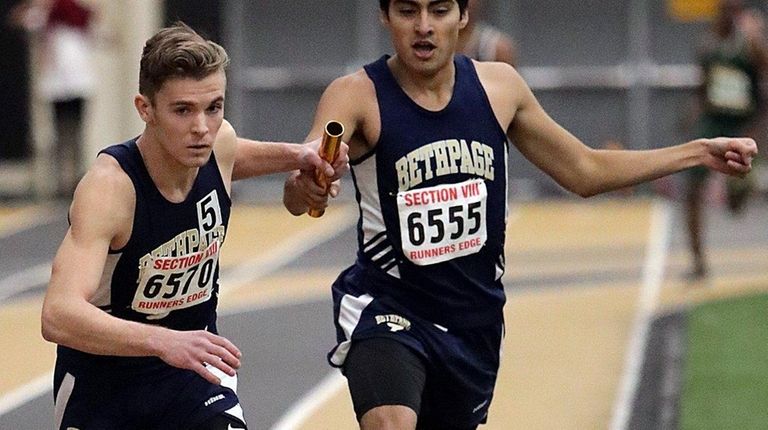 Bethpage's Justin Cano hands off the baton to