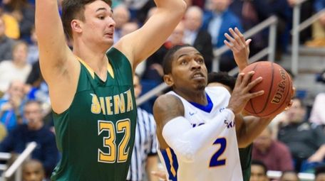 Hofstra guard Deron Powers (2) goes to the