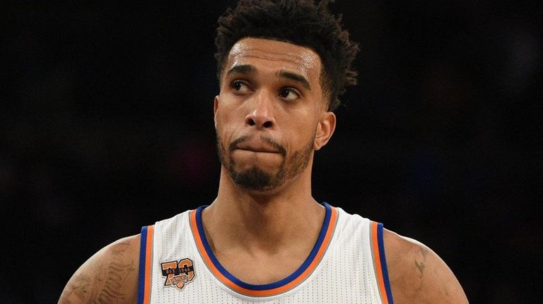 New York Knicks guard Courtney Lee looks on