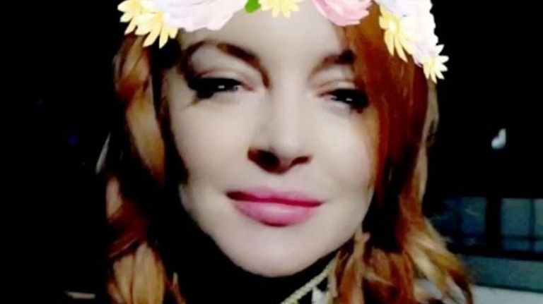 Lindsay Lohan says she will be living in