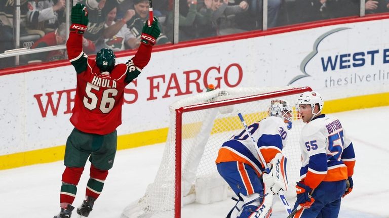Minnesota Wild's Erik Haula, left, of Finland celebrates