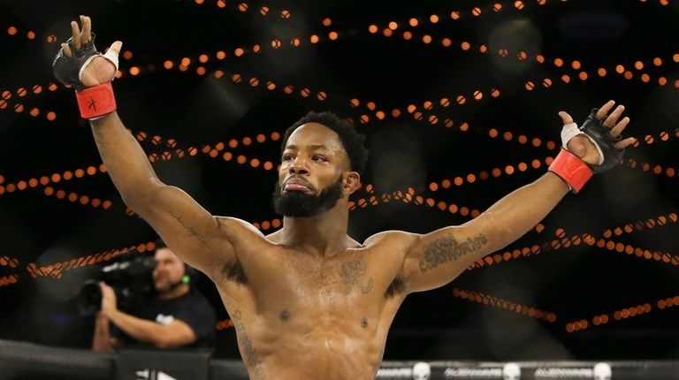 Andre Harrison celebrates his 1st round submission win