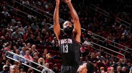James Harden of the Houston Rockets goes up