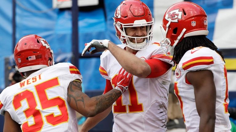 Kansas City Chiefs quarterback Alex Smith (11) celebrates