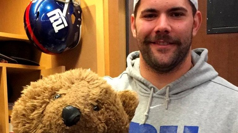 New York Giants' Justin Pugh and teddy bear