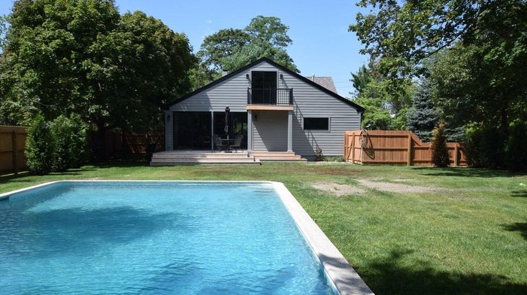 This 1950 Cape in Bellport Village is on