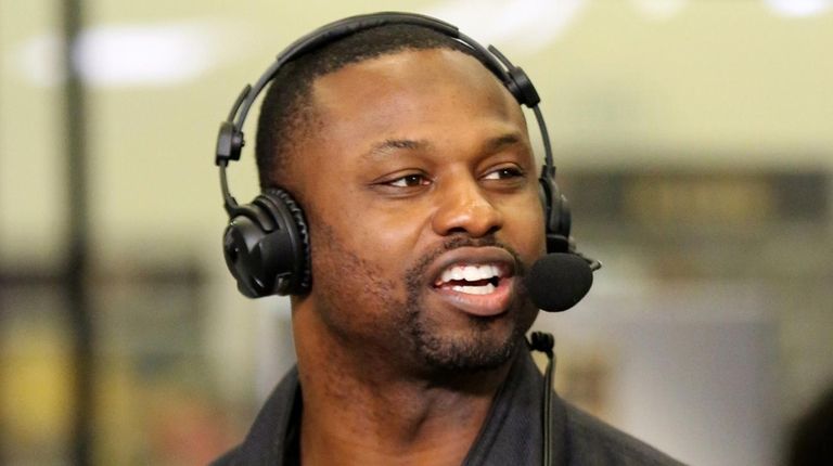 Former NFL player Bart Scott speaks during an