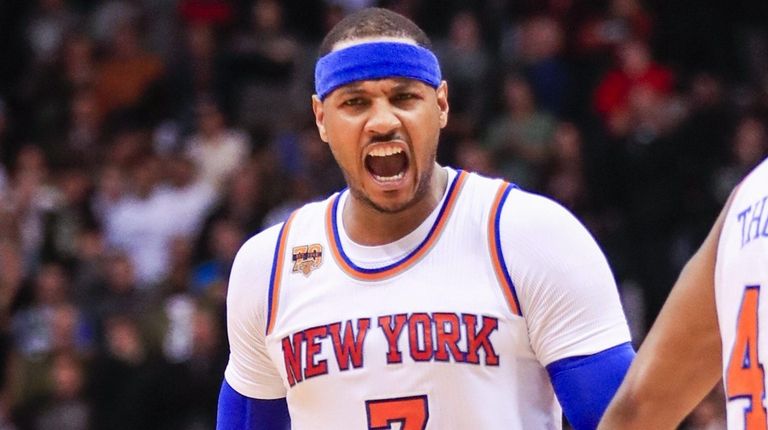New York Knicks forward Carmelo Anthony reacts after