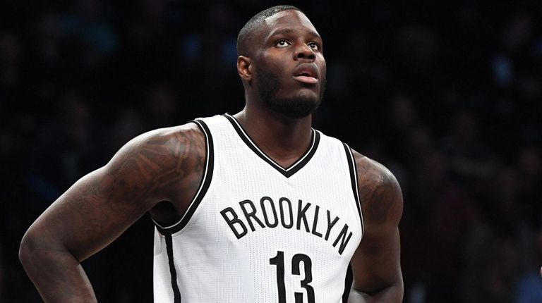 Brooklyn Nets forward Anthony Bennett looks on against