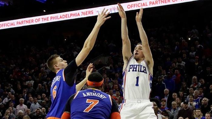 Philadelphia 76ers' T.J. McConnell (1) takes the game-winning
