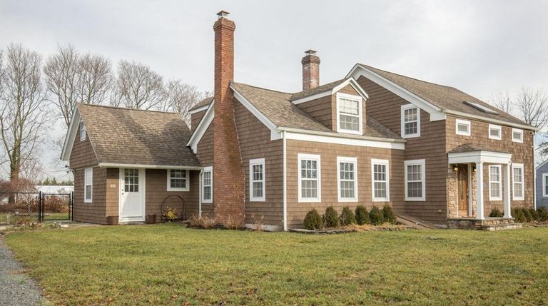 This circa-1830 farmhouse in Aquebogue is listed for