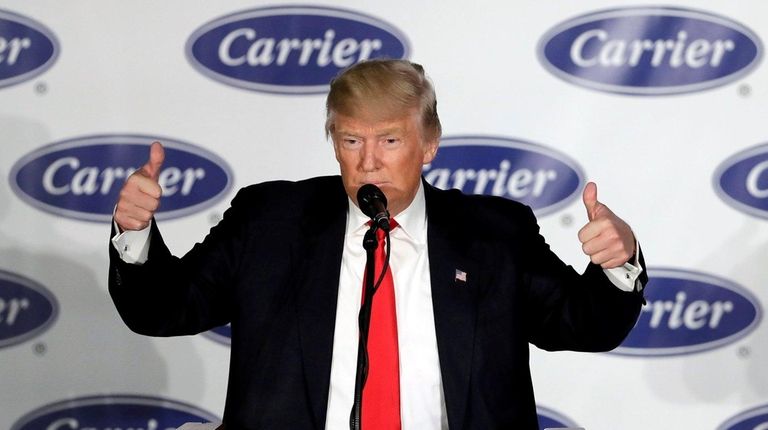 President-elect Donald Trump reacts after speaking at Carrier