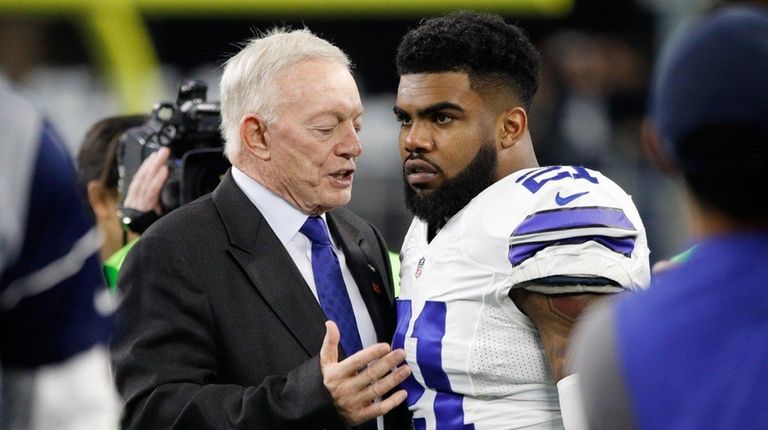 Dallas Cowboys owner Jerry Jones talks with Ezekiel
